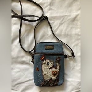 Blue cat, leather Chala crossbody purse. NWOT.